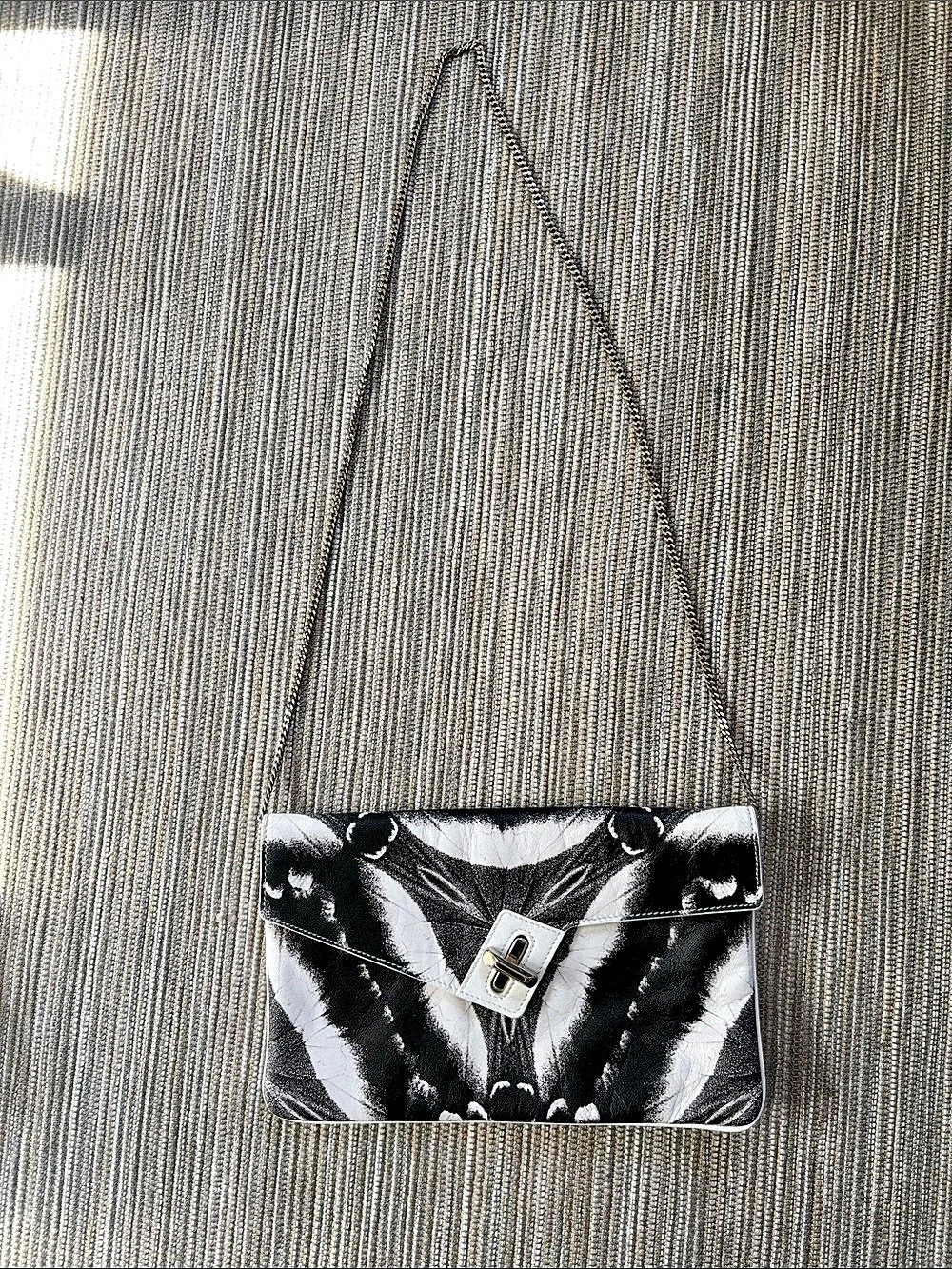 ELA leather clutch with chain, black and white botanical print